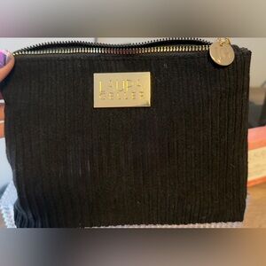 Laura Geller Black and Gold Cosmetic Bag